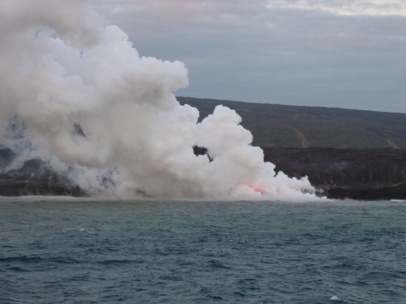 Lava flow entering the sea on SE coast of Hawaii
