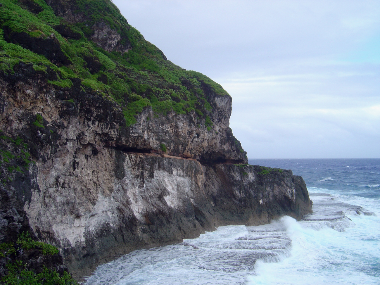 A wave-cut terrace inexorably being eroded by the sea on Guam