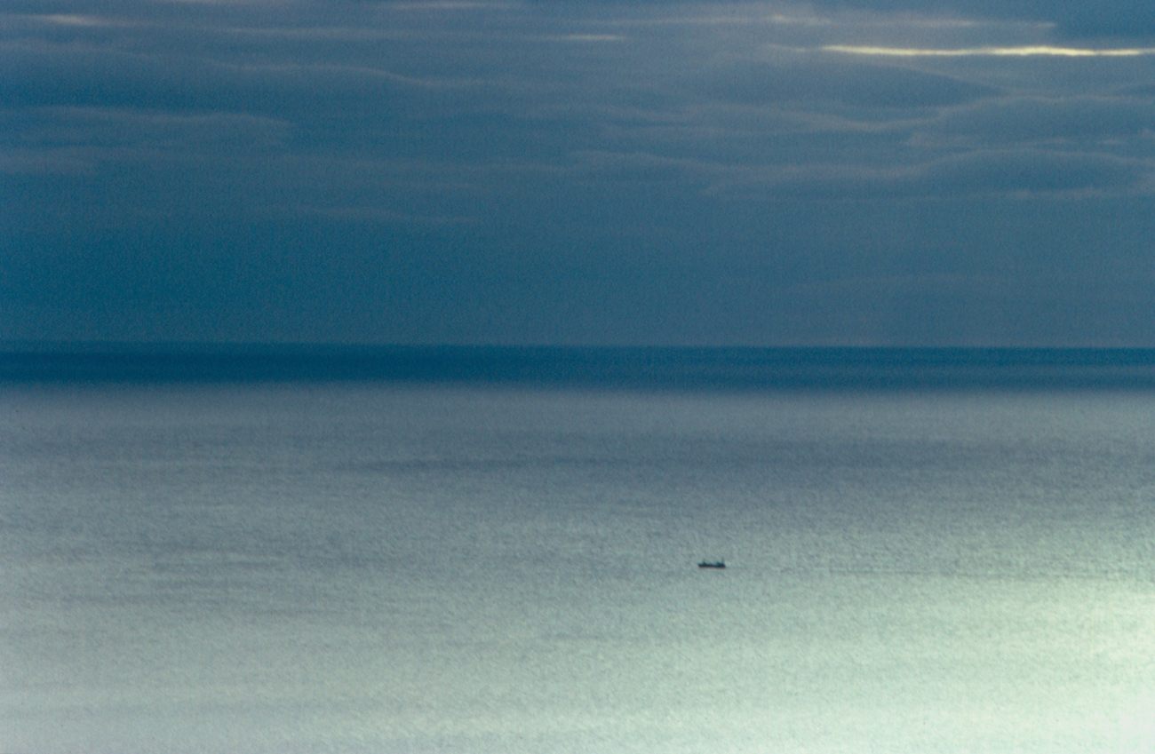 The vastness of the ocean becomes apparent in this image of a seeminglysmall ship plying its way from endless horizon to endless horizon