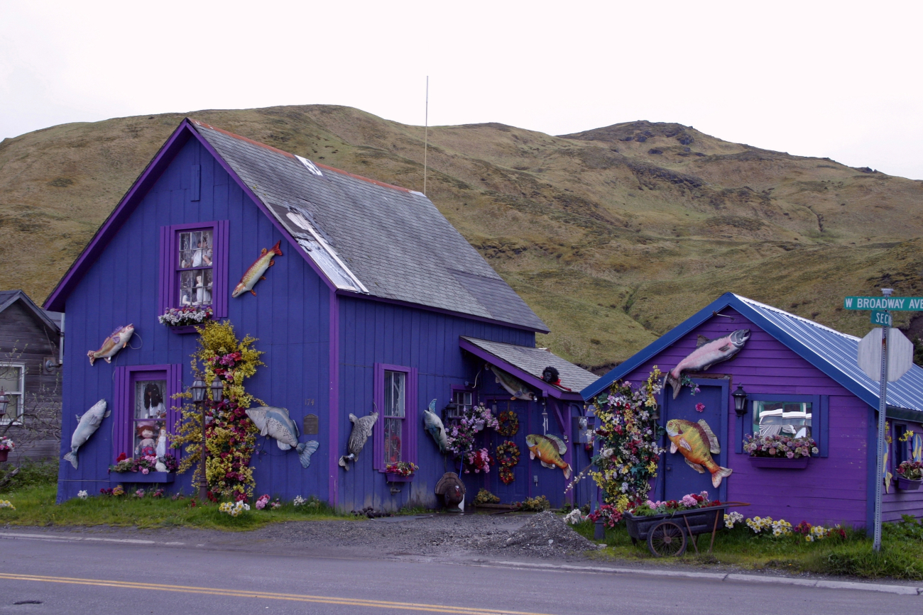 A splash of color in Dutch Harbor with fish decorations and dolls to brightenthe landscape