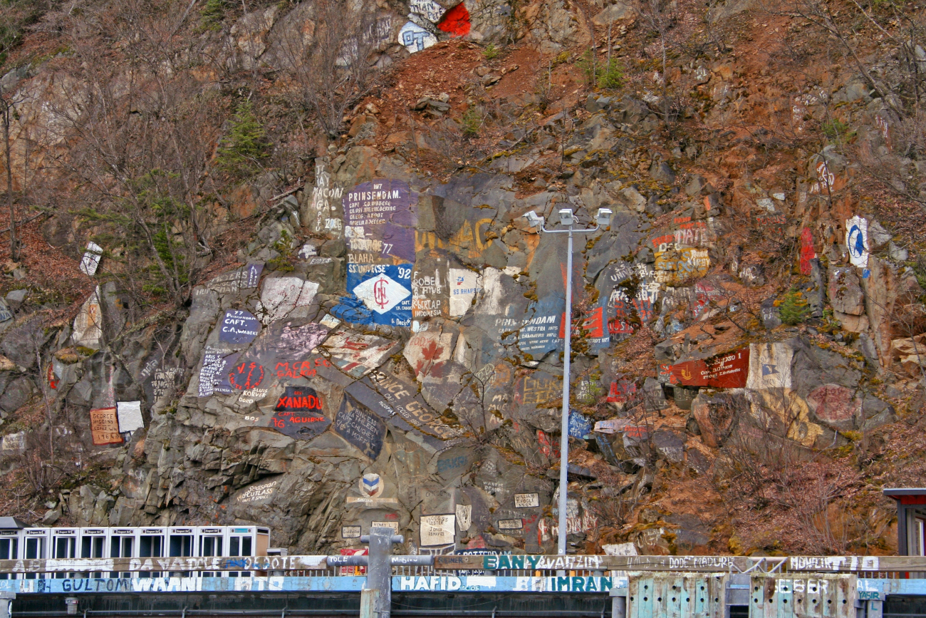 The dock at Skagway with artwork commemorating the ships that have visited here