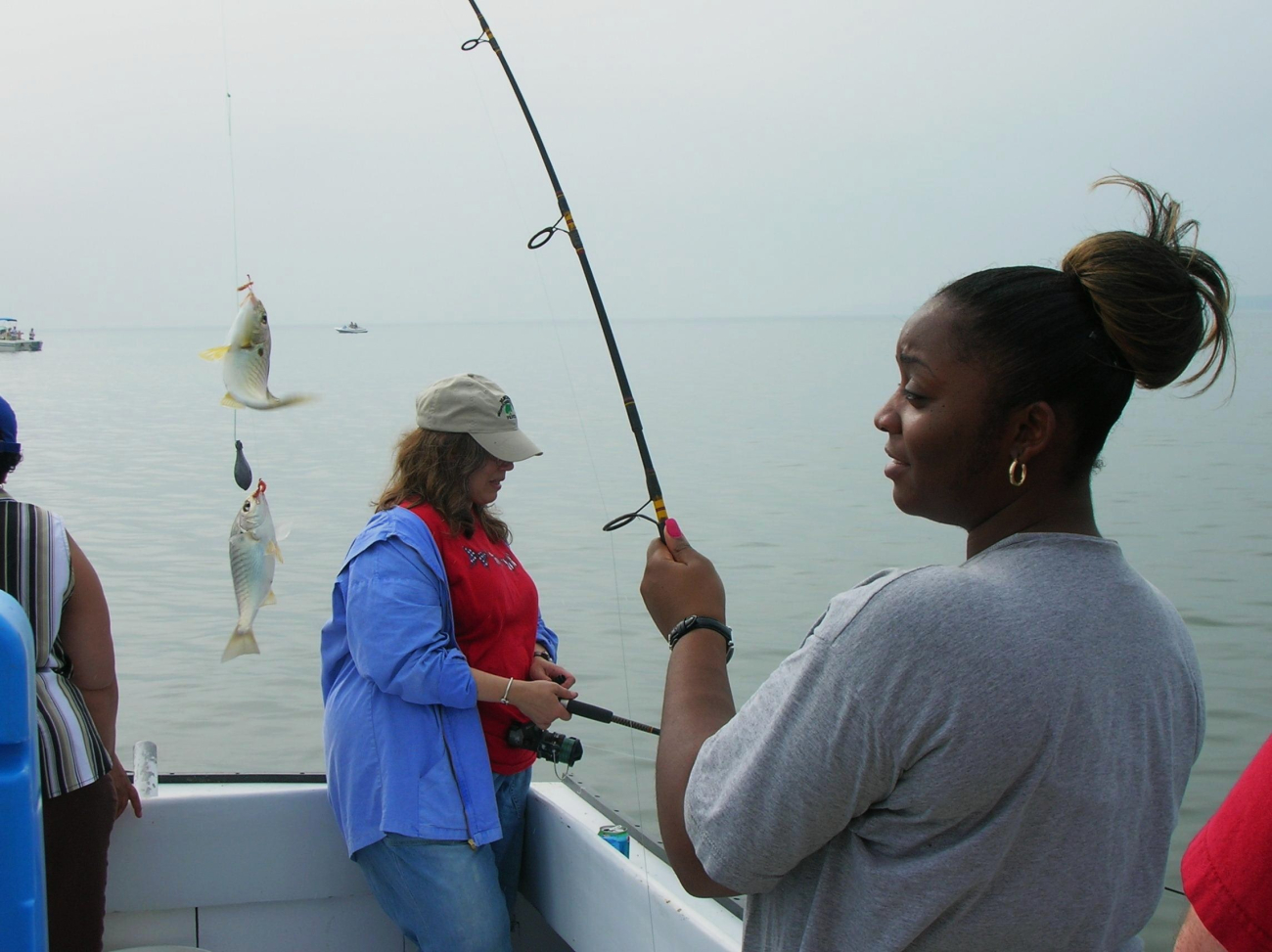 Catching fish two at a time on a calm Chesapeake Bay day