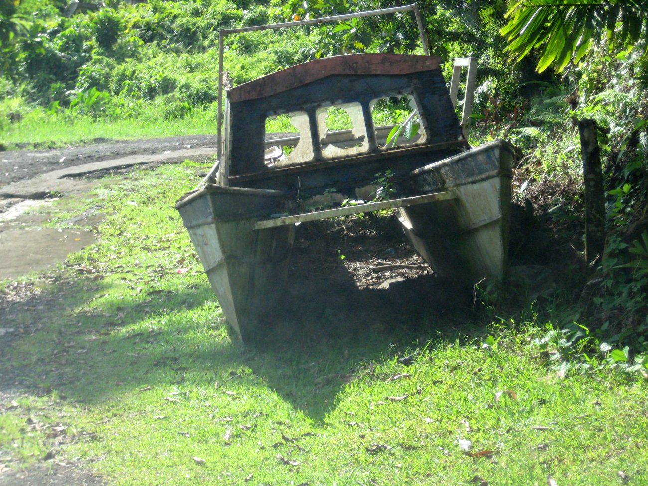 Derelict catamaran hull boat