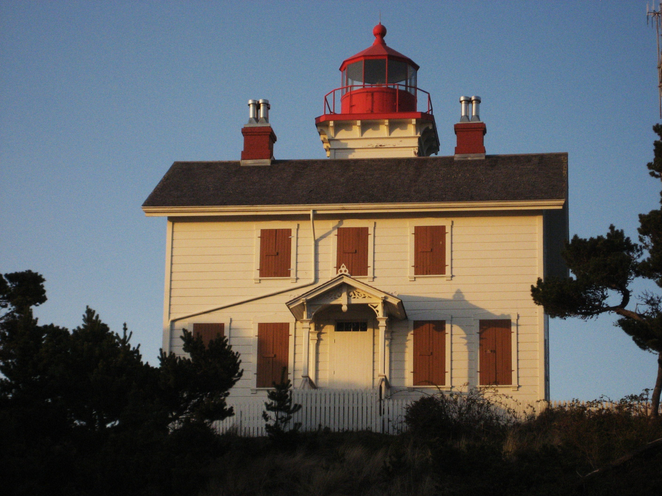 Yaquina Bay Lighthouse illuminated by the late afternoon sun