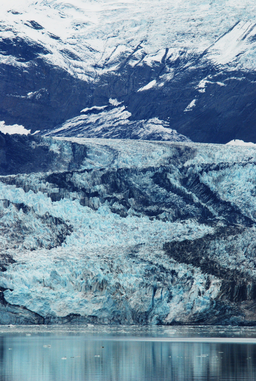Johns Hopkins Glacier showing the effect of differential melting in areas ofconcentrated rock material
