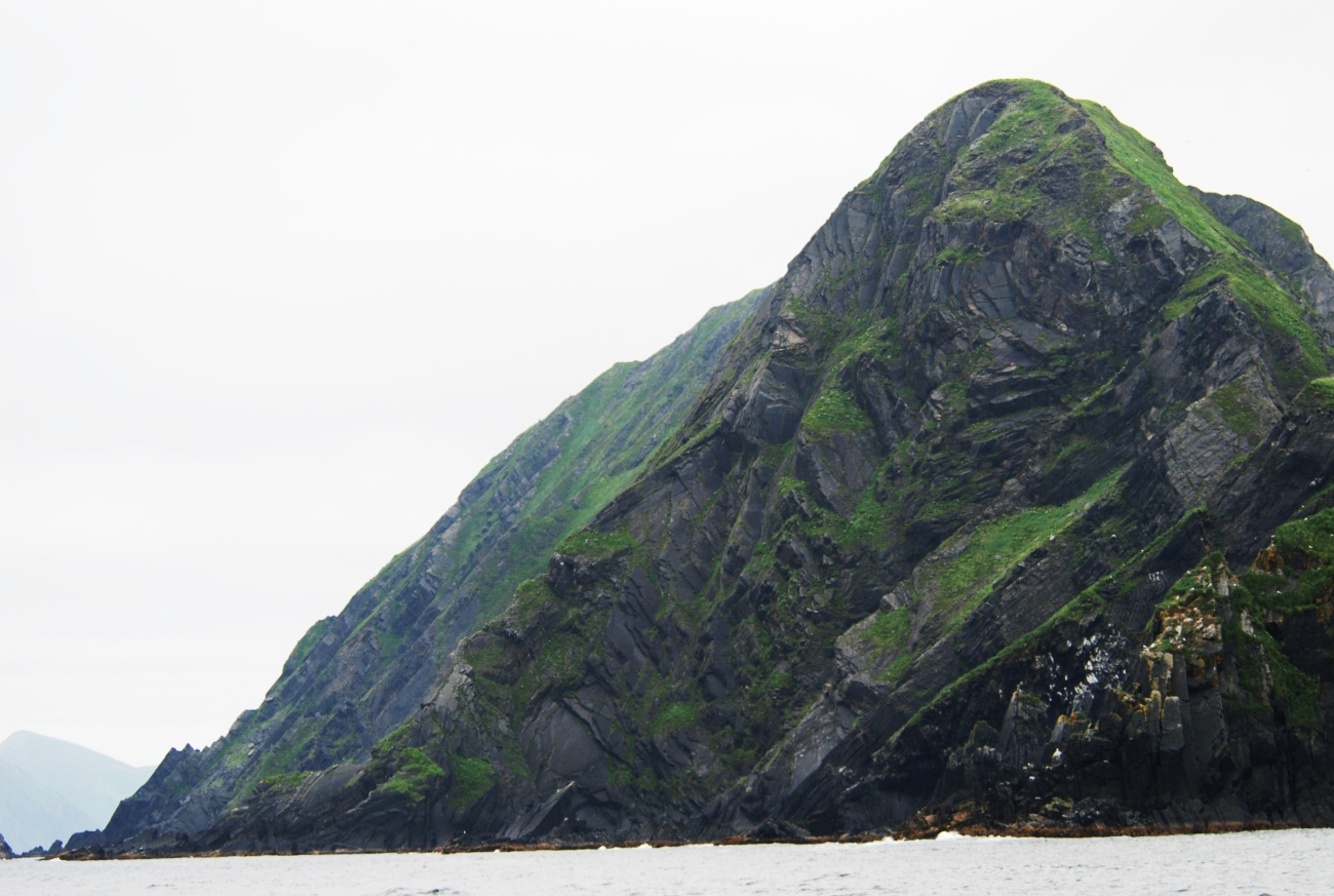 Bent, broken, uplifted rock formations on Big Koniuji Island