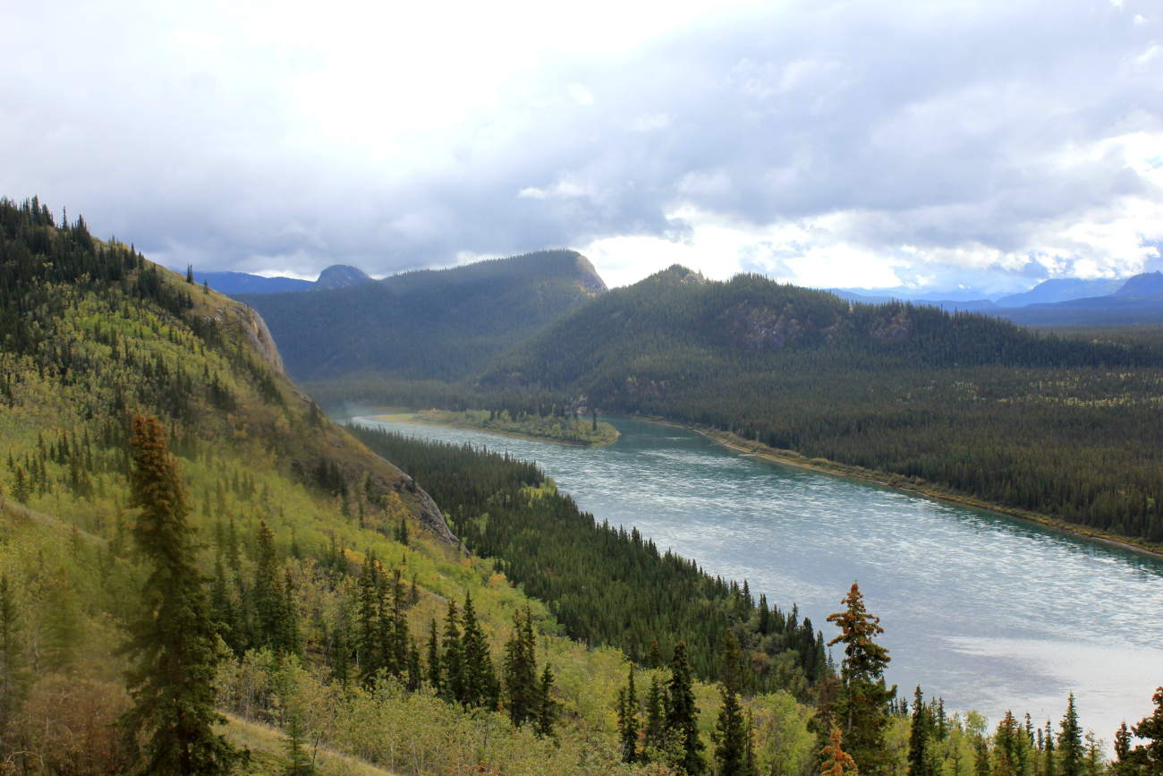 A view along the Yukon River looking towards the area of the Den of the GiantFrog, Ts'al Cho An in northern Tutchone, an Athabascan nativelanguage