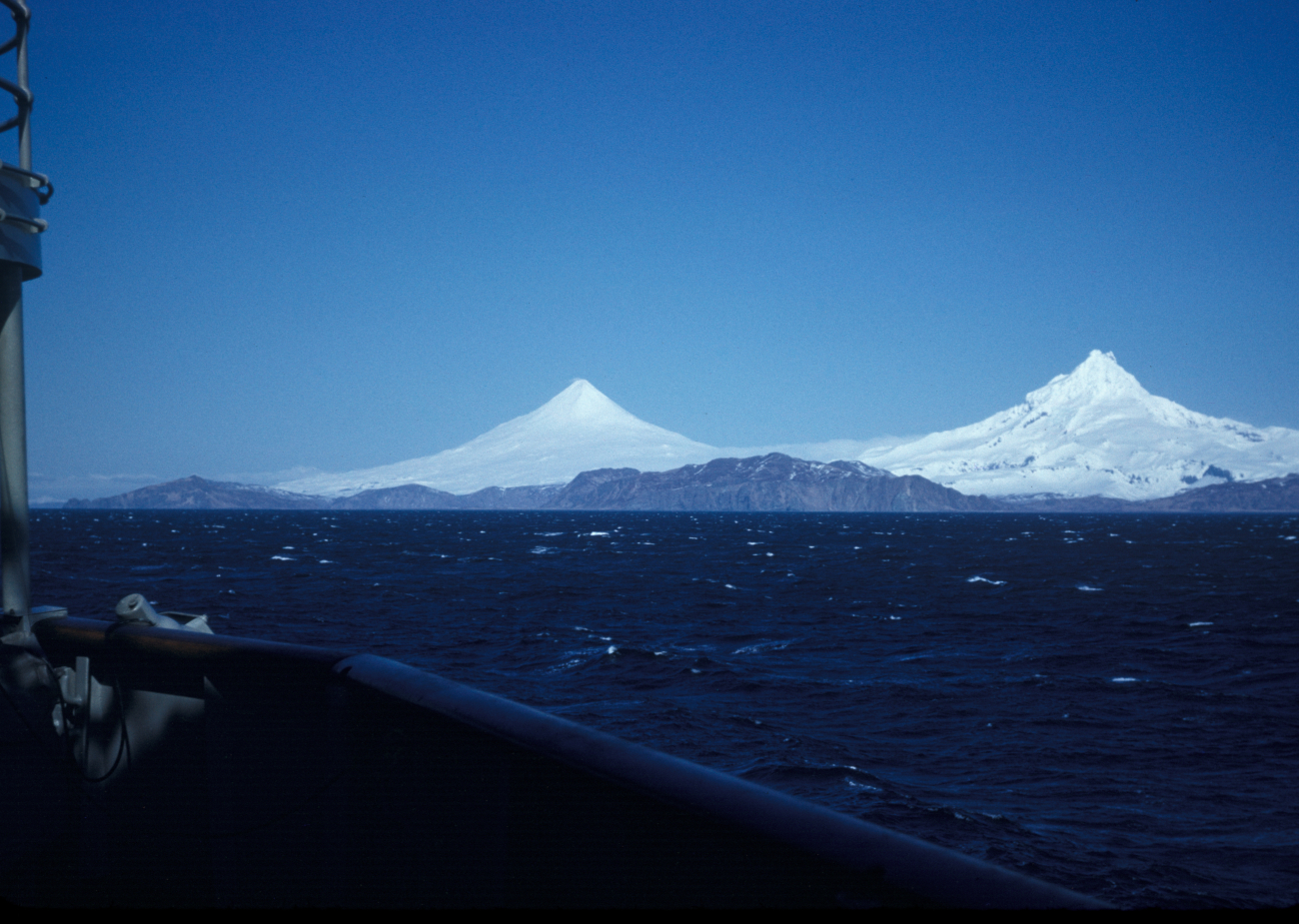 Magnificent view of Shishaldin and Isanotski volcanoes from offshore