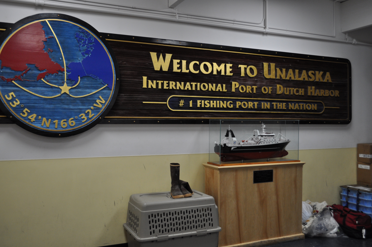 Sign welcoming all who come to Unalaska, the International Port of DutchHarbor and the #1 Fishing Port in the Nation