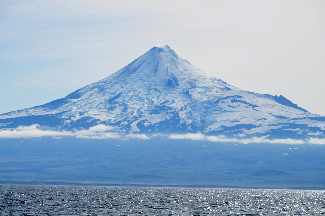 A telescopic view of Shishaldin Volcano from the Bering Sea