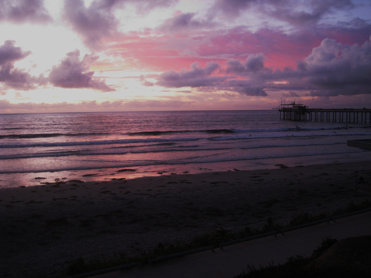 The end of day at Scripps Institution of Oceanography - the last surfers haveleft the water and the waves roll in unridden