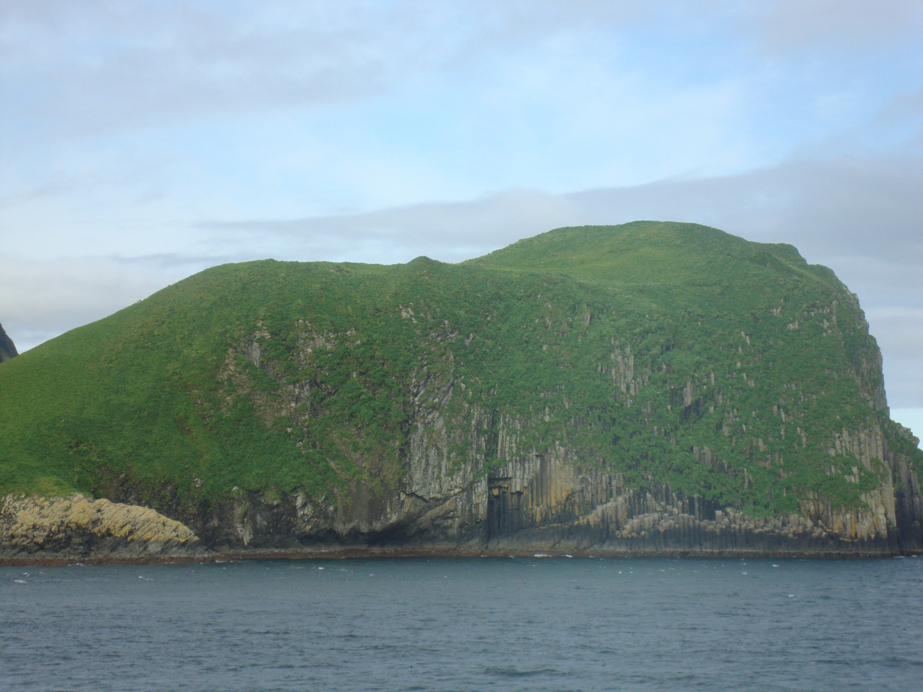 When this island formed, volcanic lava cooled into basalt hexagonal columns
