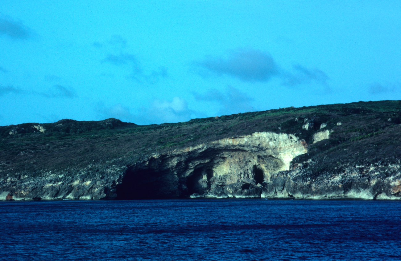 Sea caves along the Pagan Island shoreline