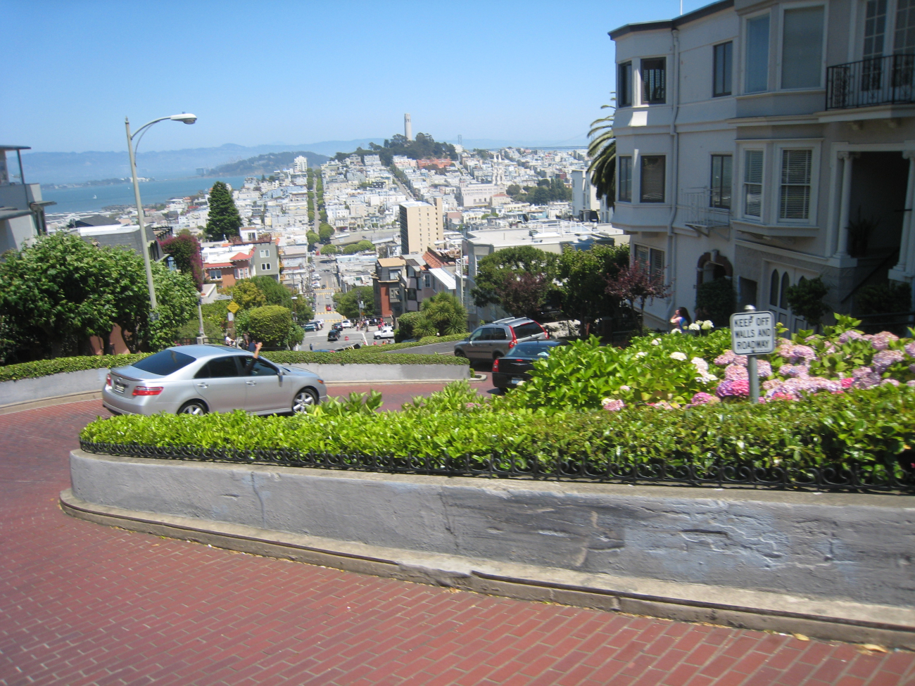 Two of the eight switchbacks of Lombard Street - looking towardCoit Tower