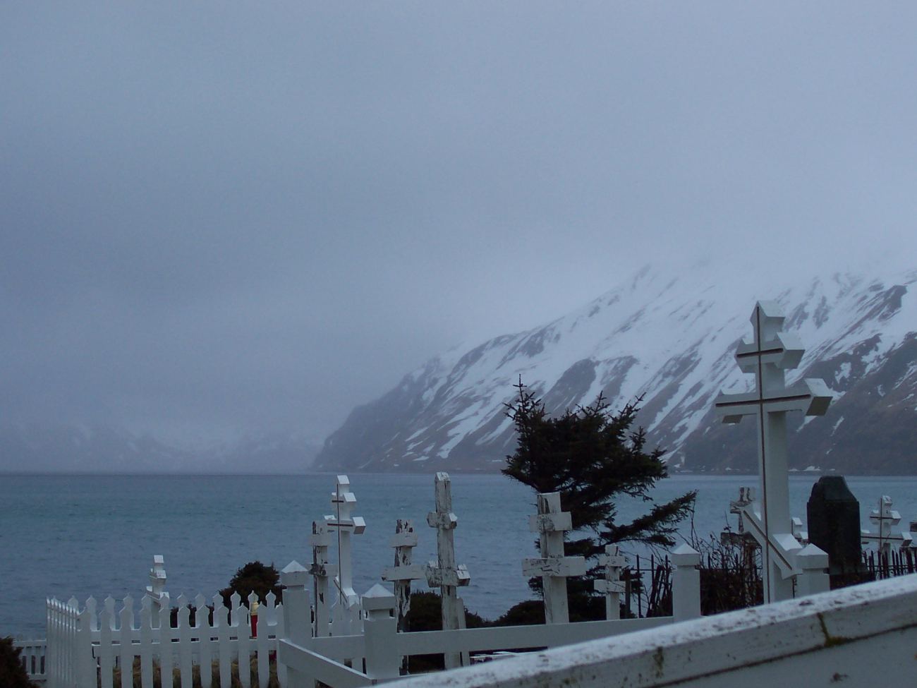 Crosses at the Russian Orthodox Cemetery at Dutch Harbor on  a gray and winteryday