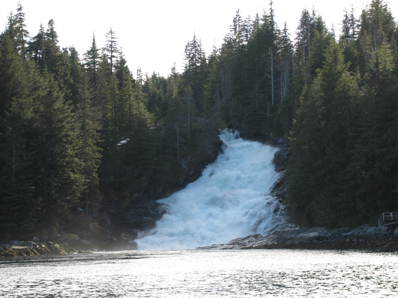 Baranof River waterfalls as they enter Warm Springs Bay