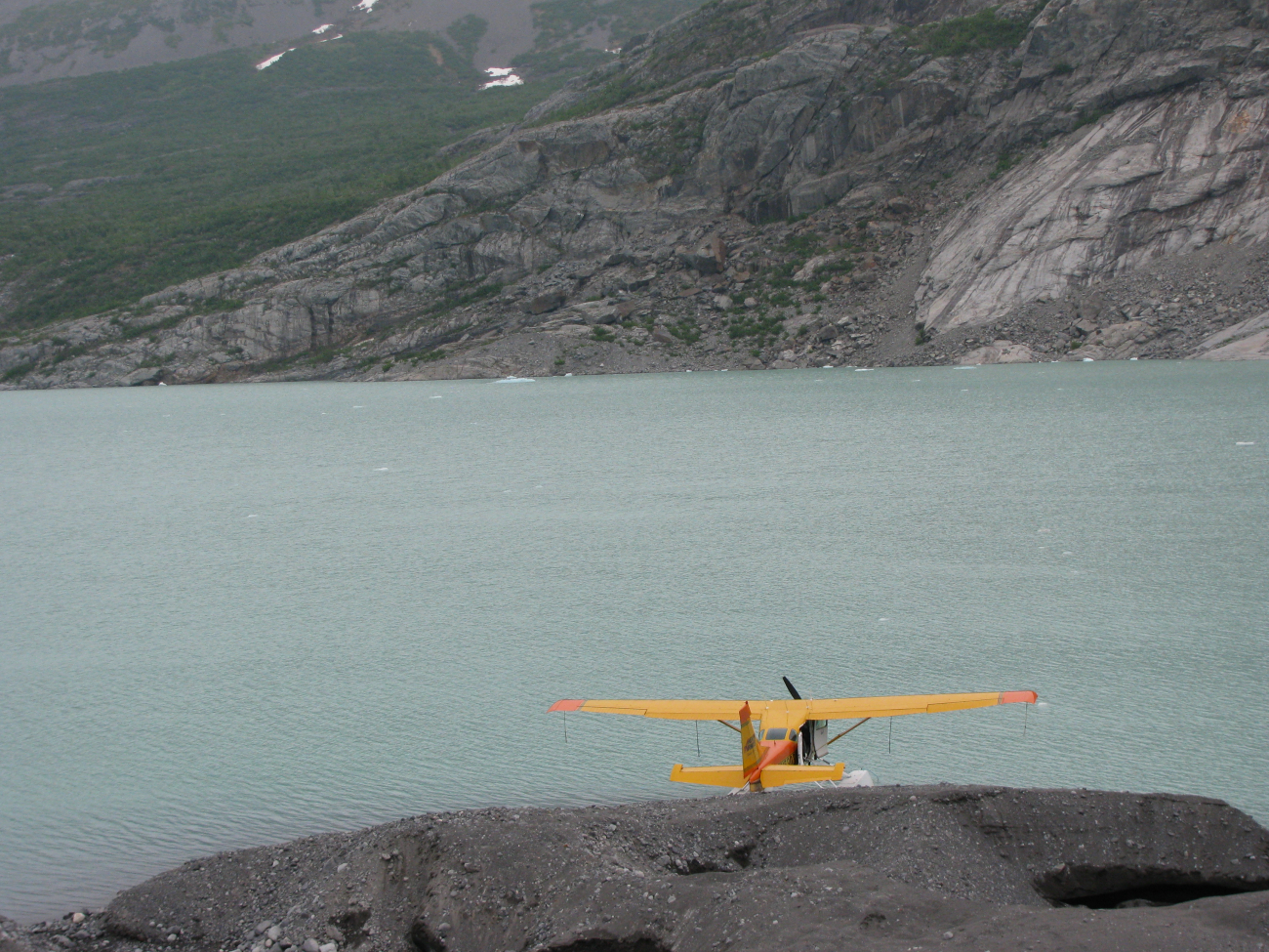 Float plane on Hallo Glacier melt lake