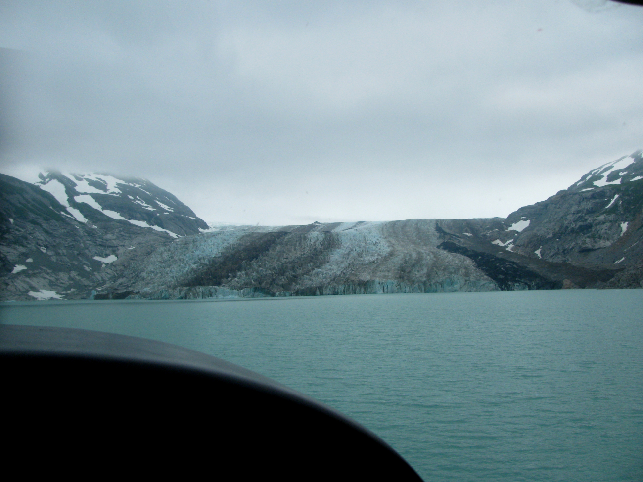 Hallo Glacier terminus on a small glacial lake