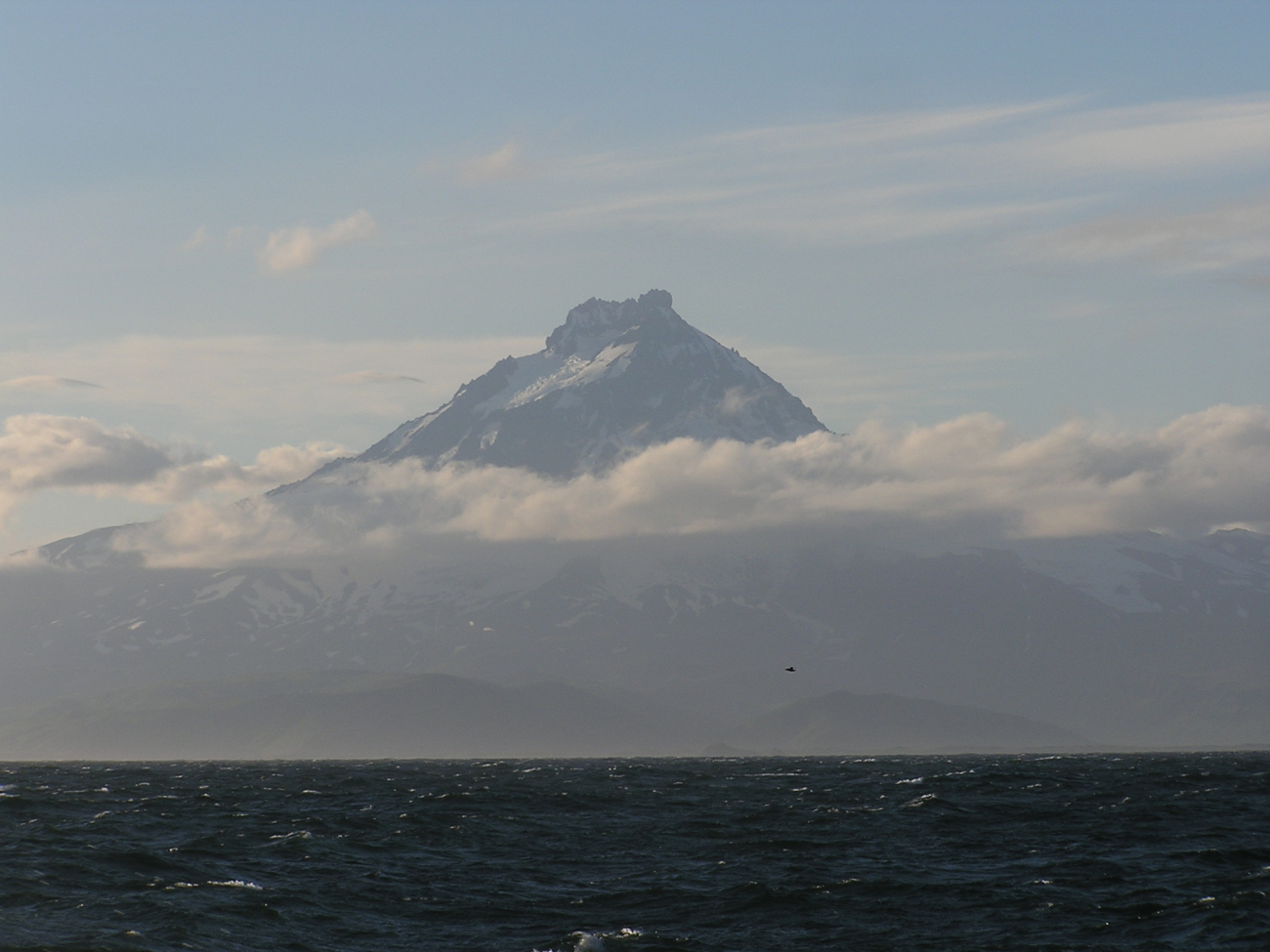 Isanotski Volcano, also known as Raggedy Jack seen on a misty day