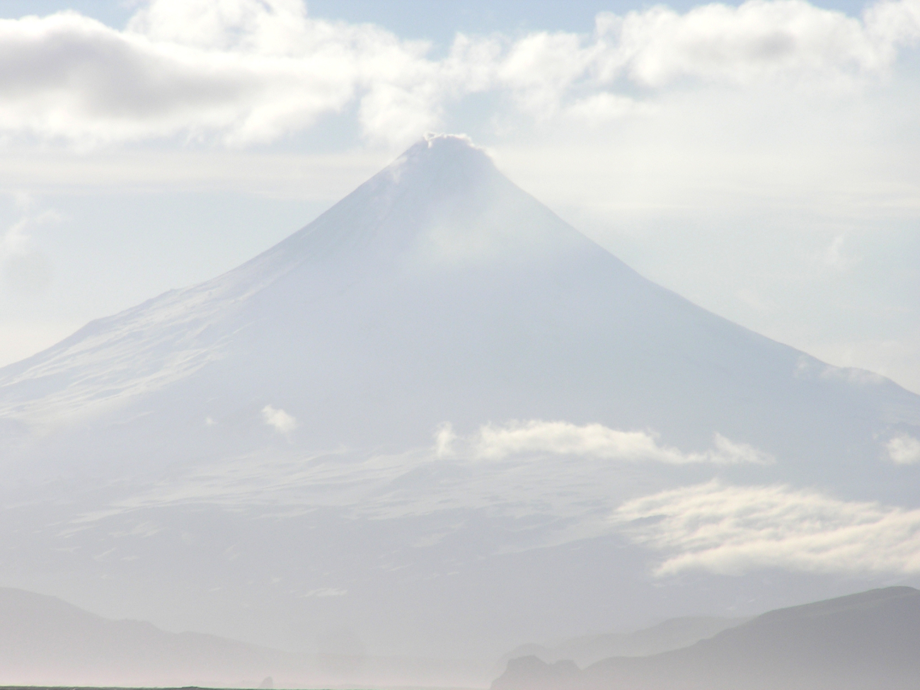 Shishaldin Volcano, among the most perfectly symmetrical volcanic cones on Earth