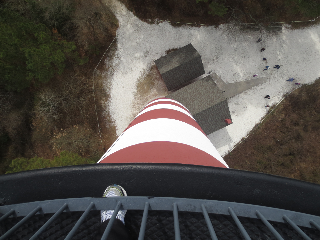 Looking down from Assateague lighthouse to the oilhouse and people below