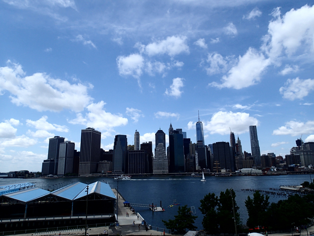 A spectacular view of the south tip of Manhattan Island from Brooklyn BridgePark
