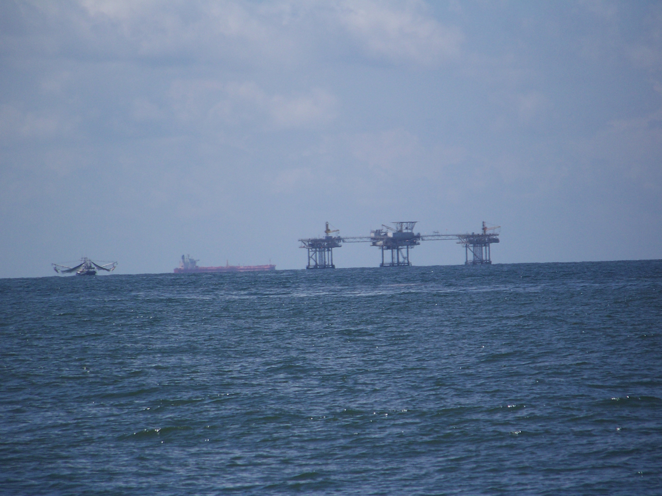 The Gulf of Mexico -  Oil platforms, tankers, and fishing vessels