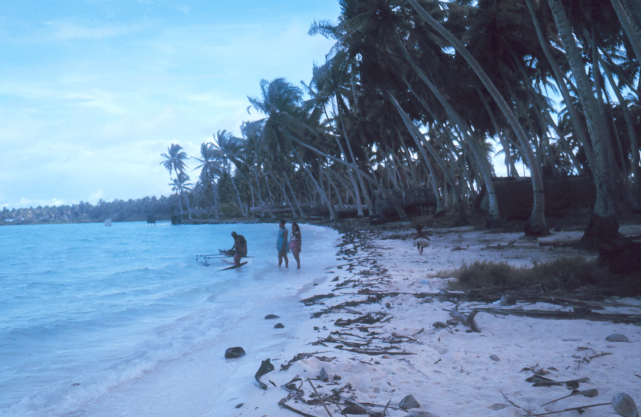 Fanning Island lagoon shoreline with native outrigger
