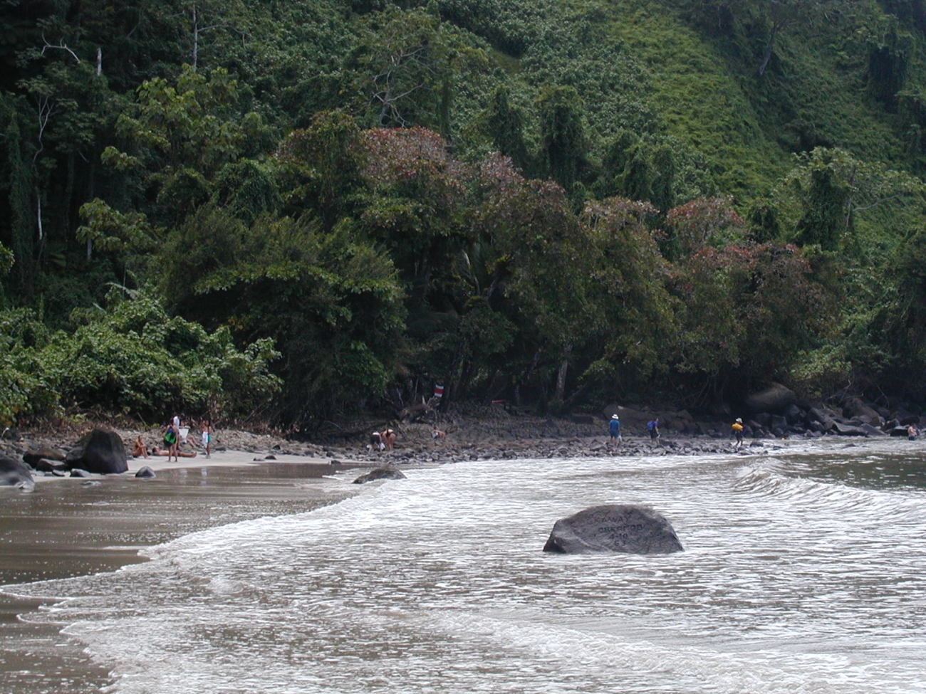 Crew and scientists adventuring on the beach at Isla Cocos