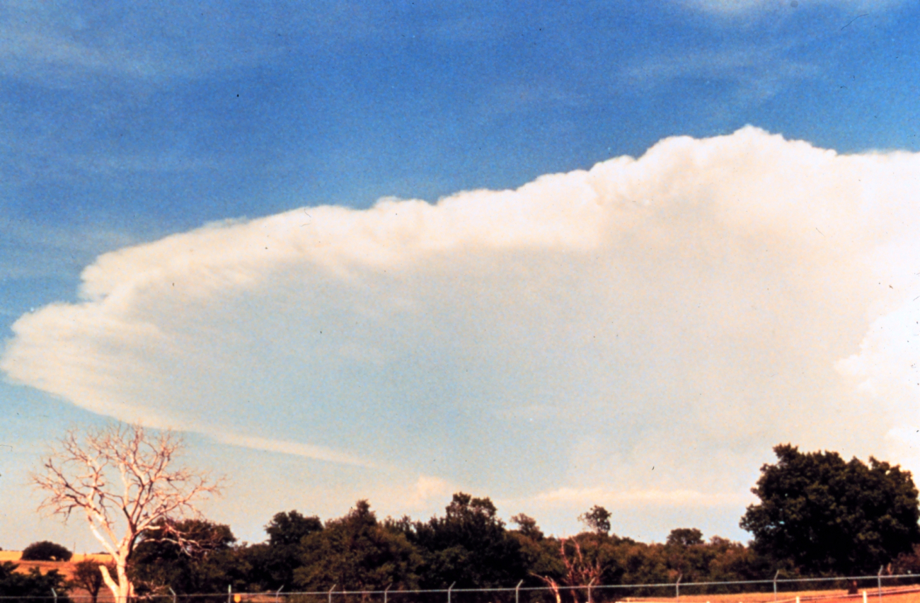 Anvil of large cumulonimbus thunderhead during early stages of developing storm