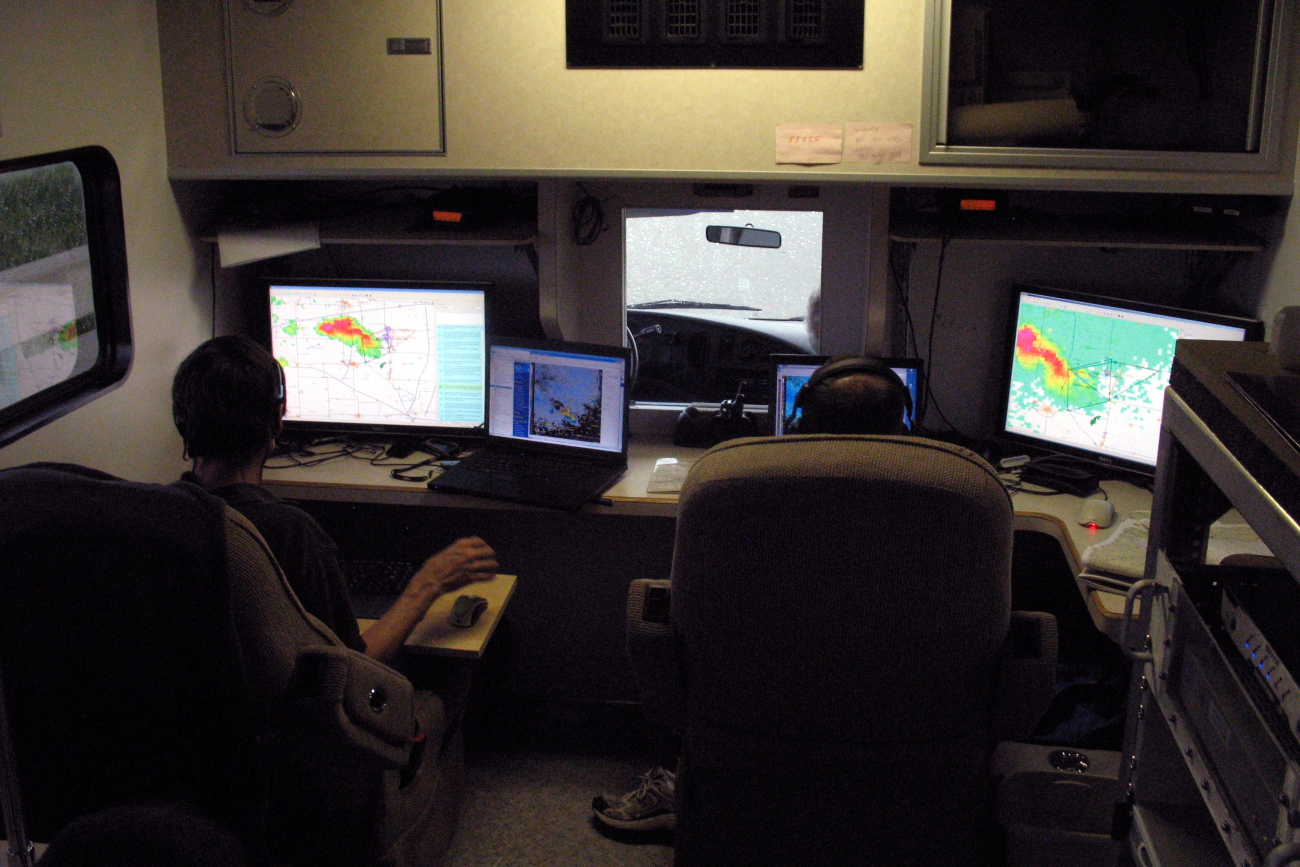 Erik Rasmussen and David Dowell coordinate VORTEX II intercept operations fromthe Field Command Vehicle