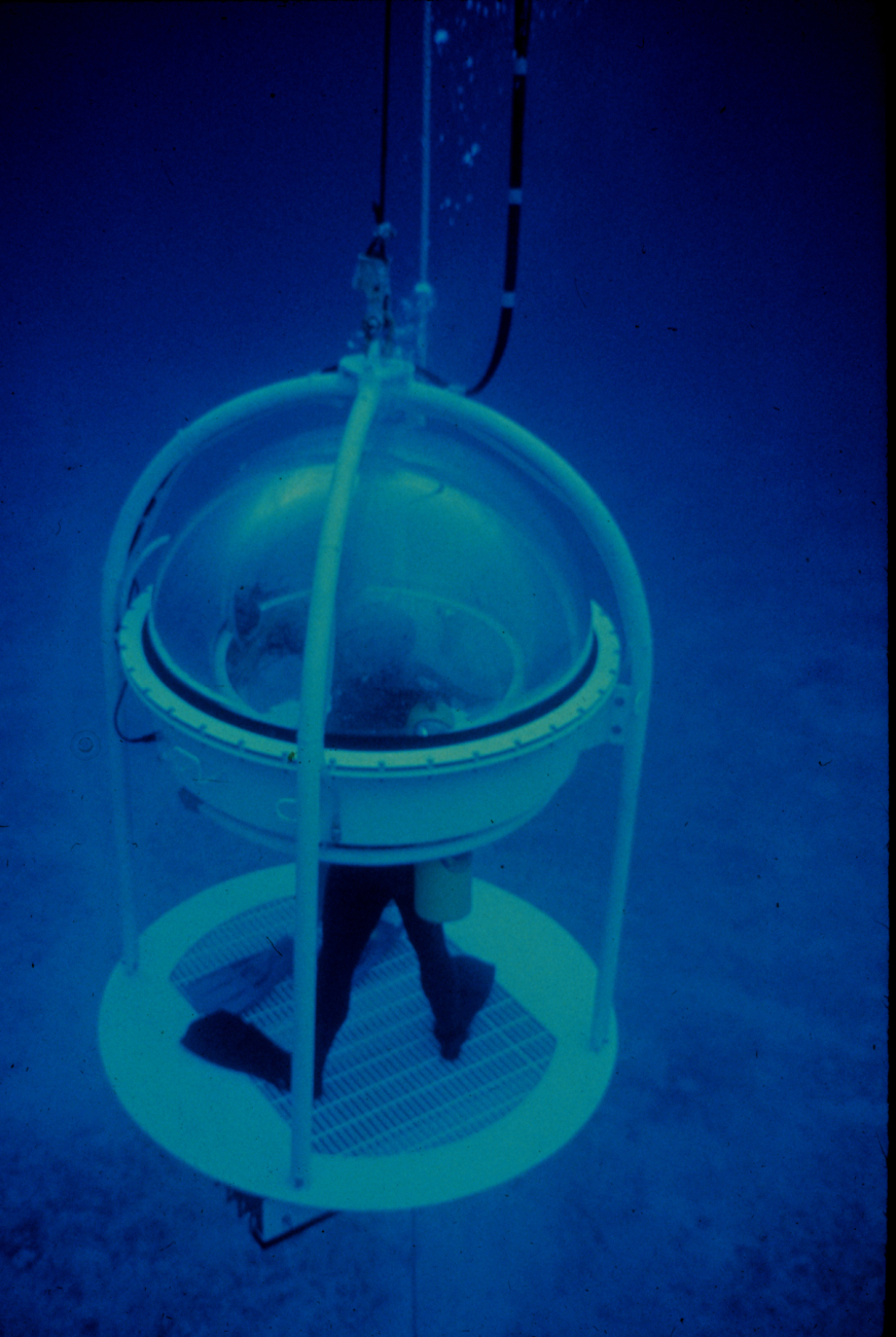 In the air-filled bell dome, divers can talk to each other and the surface
