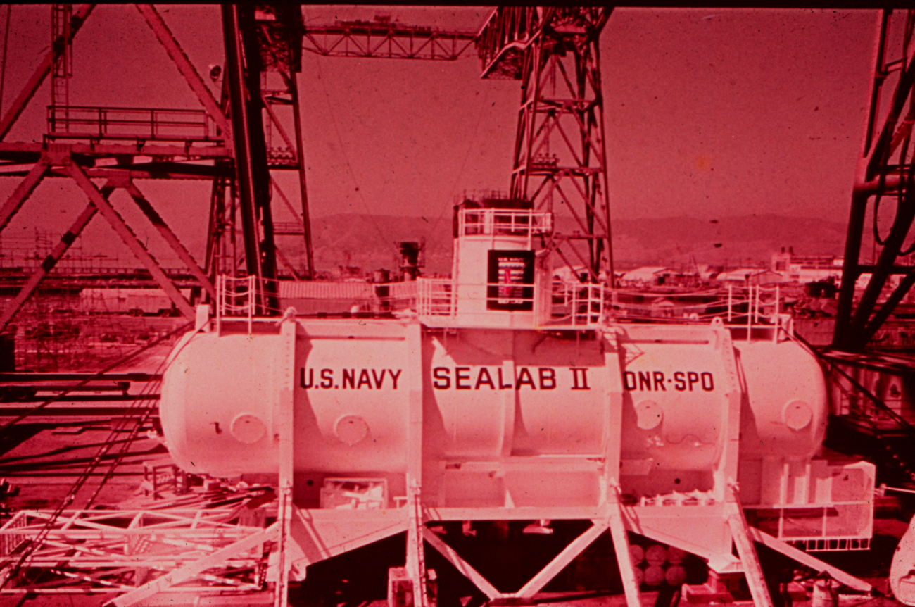 SEALAB II, resting on an angle off California,  was dubbed the Tilton Hilton