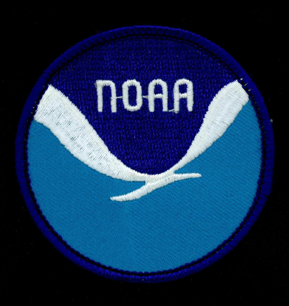 Patch showing the official emblem of the National Oceanic and AtmosphericAdministration