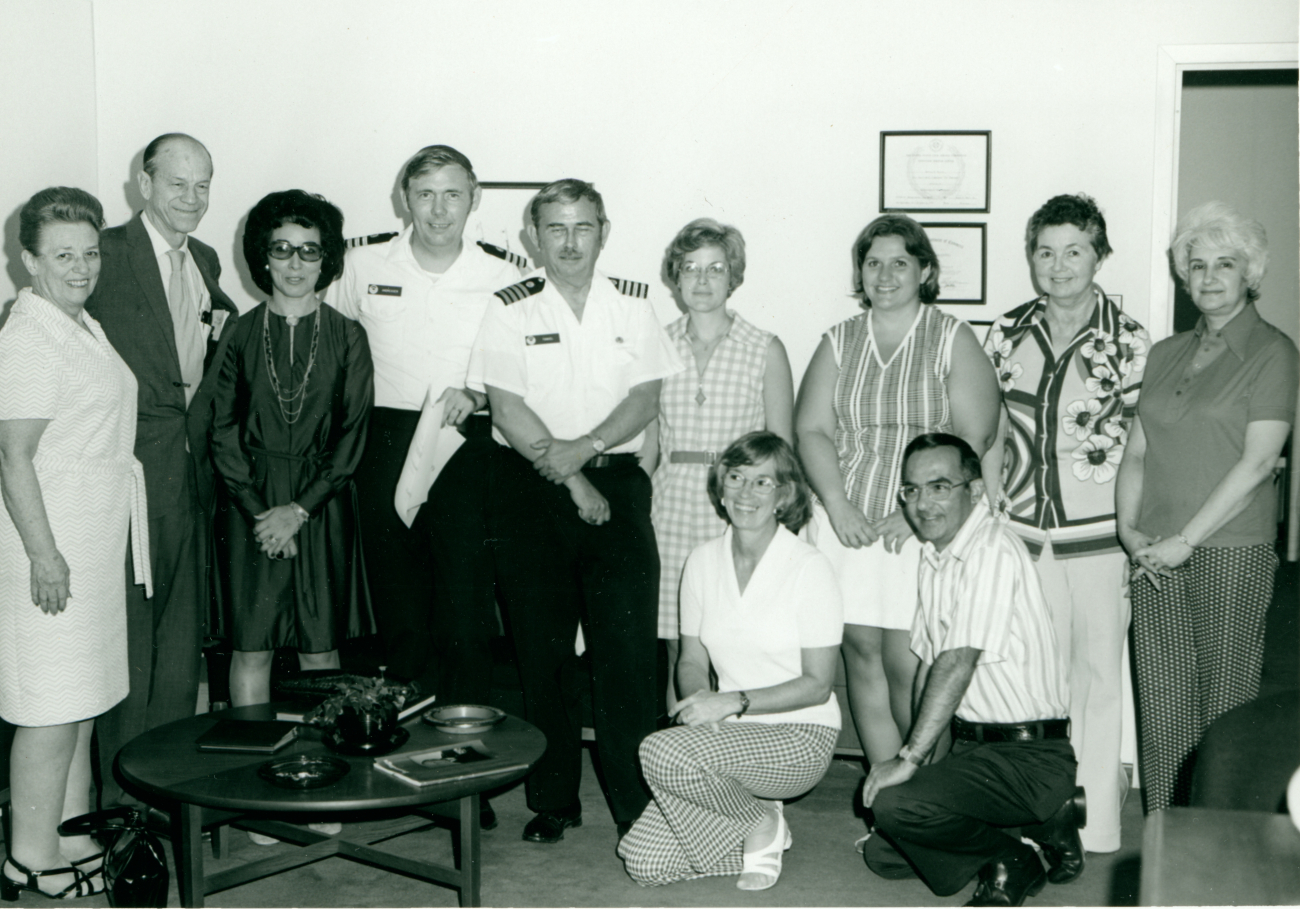 Personnel of Commissioned Personnel Center: CDR Chris Andreasen in center left,CAPT Miller Tonkel, and two from his left, Peggy Davis, longtime help to manyNOAA Corps officers