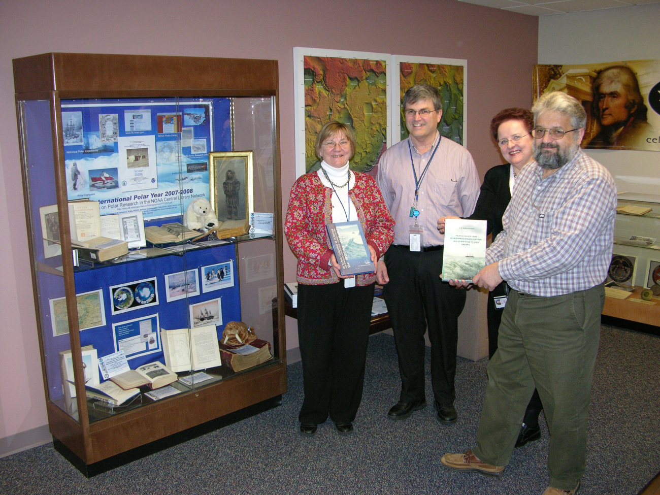 Janice Beattie, Director of NOAA Central Library, Albert Theberge and AnnaFiolek of NOAA Central Library, and Dr