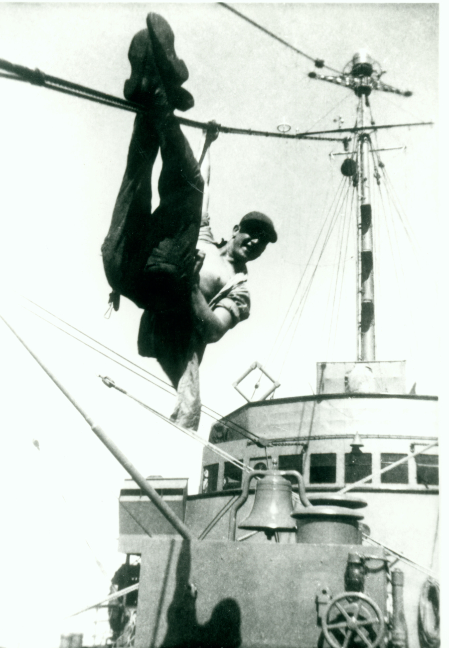 Jerry Randall changing anchor light on USC&GS; Ship EXPLORER