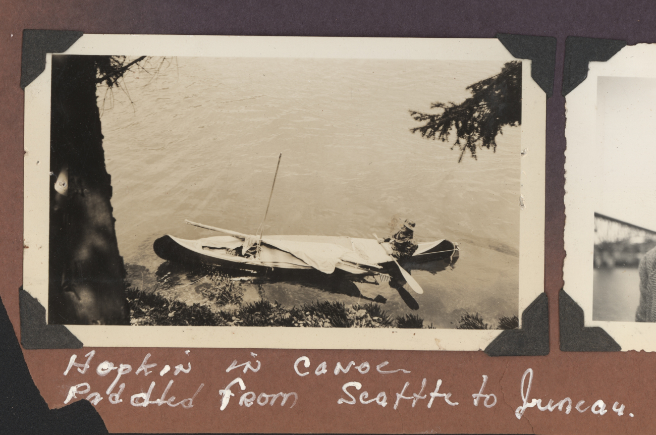 Burt Hopkins in the canoe he paddled from Seattle to Juneau, Alaska