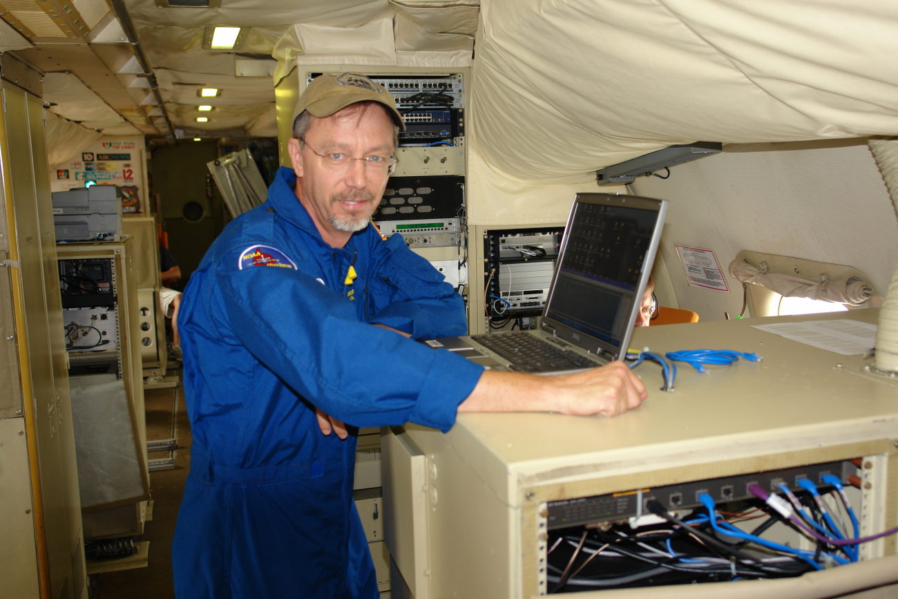 Unidentified hurricane researcher on NOAA P-3 Orion hurricane researchaircraft