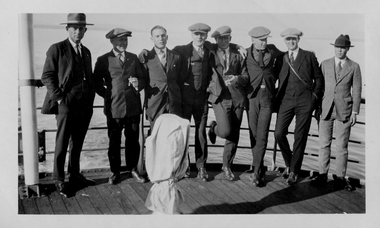 Captain Bob Bartlett explaining the use of the sextant to David Putnam, stepsonof Amelia Earhart, on a voyageof the MORRISSEY to Greenland