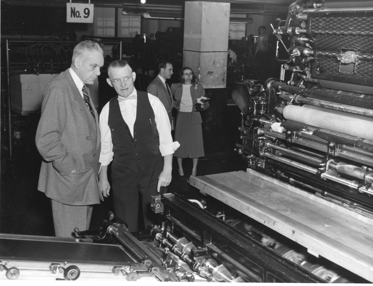 Congressman Campbell of Florida being briefed on printing process by Thomas Shea