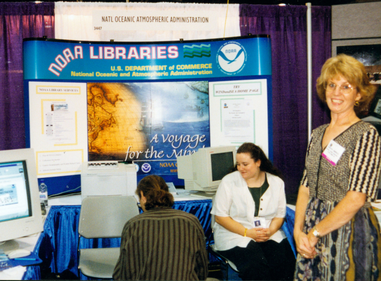Anna Fiolek - cataloger and ultimately chief cataloger of the NOAA CentralLibrary - sitting, and Dottie Anderson, reference librrarian, standing to theright