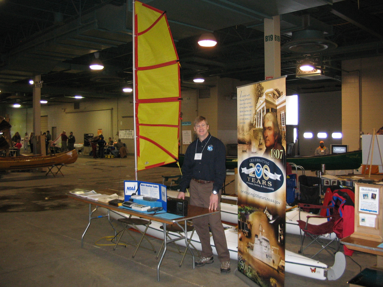 NOAA Grand Rapids  NWSFO Mark Walton manning a booth at theQuiet Waters Symposium in Lansing