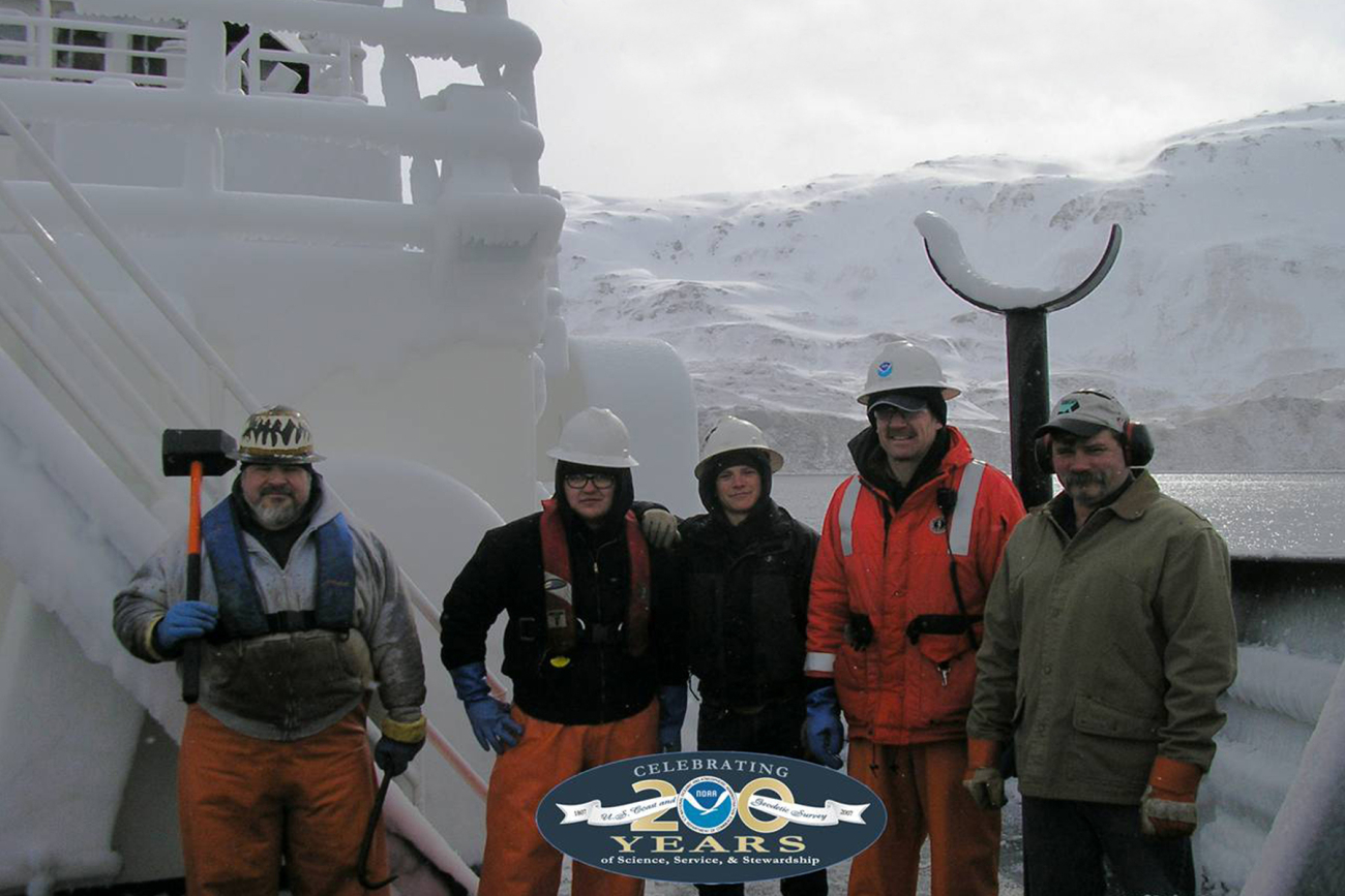 Frozen spray coats the NOAA Ship Oscar Dyson, shown here preparing to anchorin Makushin Bay, Alaska