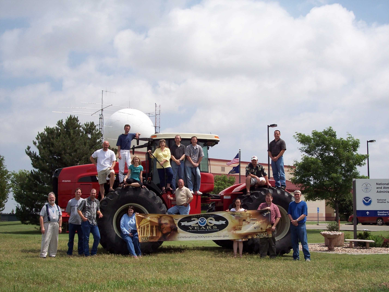 At the recent NOAA Fish Fry Kansas Style (burgers and brats) the staff of theGoodland WSFO checked out a tractor from Yost Farm Supply as neighboringfarmers prepare for wheat harvest on the High Plains