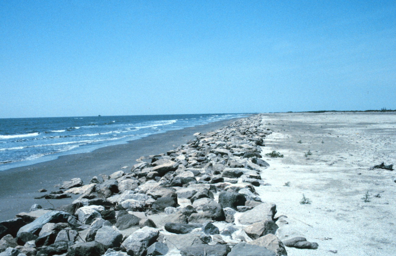 The rock revetment shoreline of the restored area of East Timbalier Island