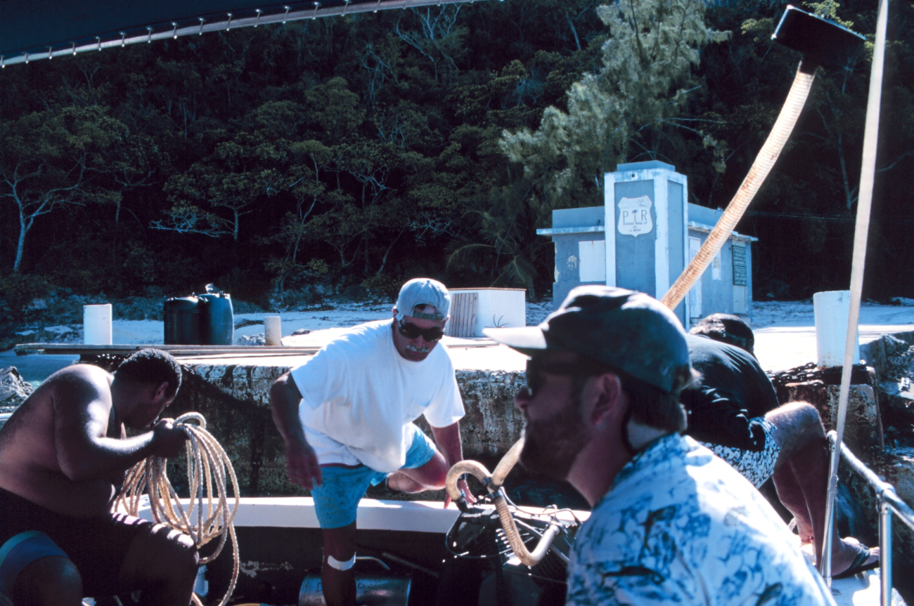 In the foreground, John Iliff, the NOAA project manager for therestoration at Mona Island prepares to dive