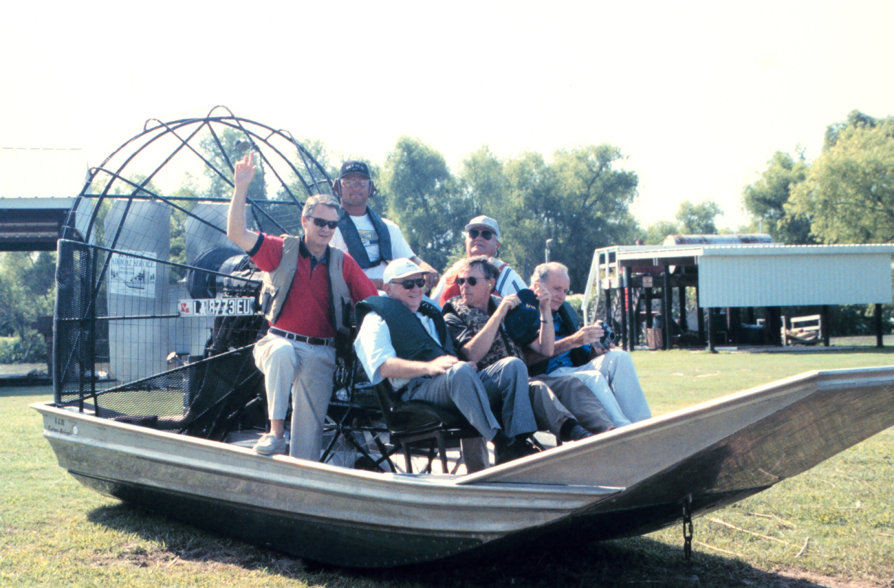 Senator Breaux and other dignitaries prepare for an air boat tour of therestoration project