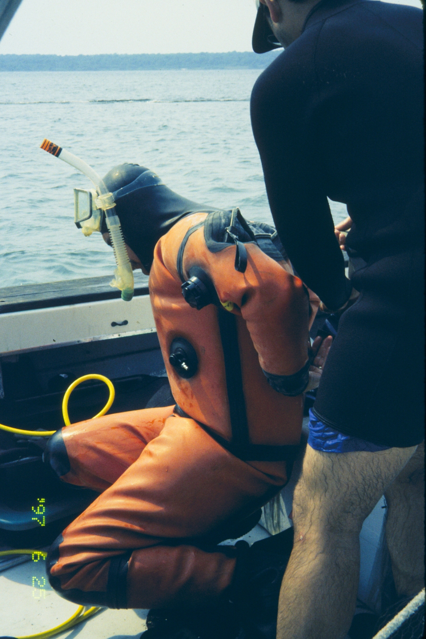 The first in a series of images showing NOAA scientists at the 1997 transplantsite just before transplanting the eelgrass turf