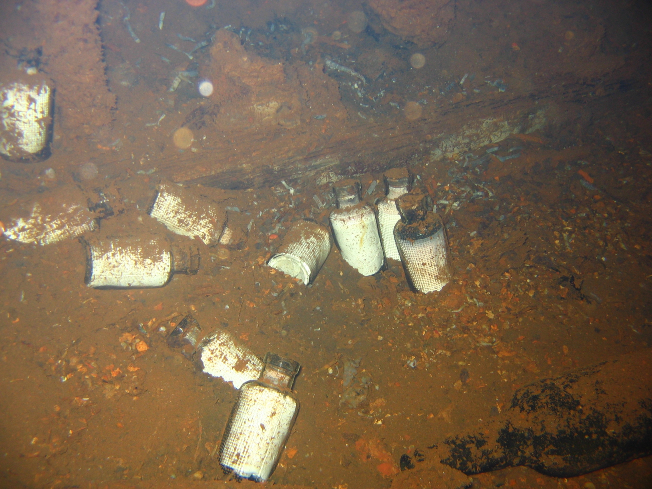 Medicine bottles strewn about the hold of the Fujikawa Maru